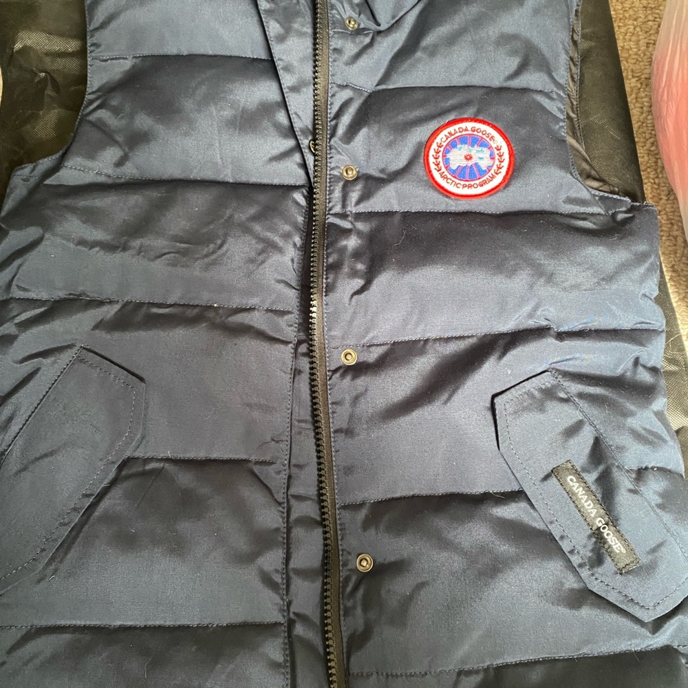 Canada Goode best with dust cover. New with tags. Runs small.